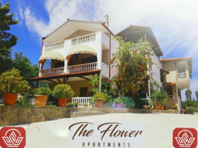 THE FLOWER APARTMENTS